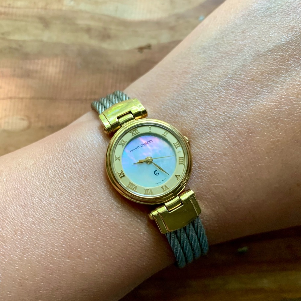 Philippe Charriol ladies watch: mother-of-pearl dial and stainless steel.